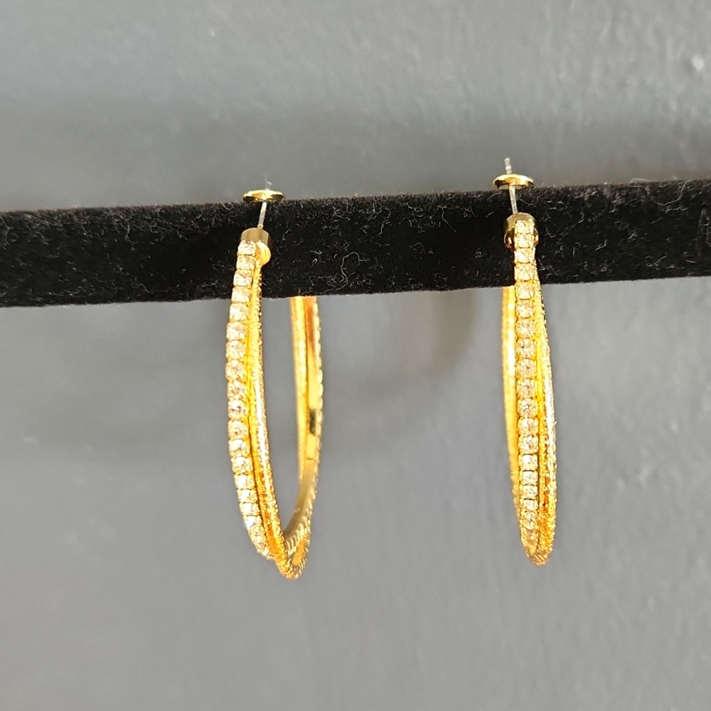 Rhinestone and gold hoop earrings
